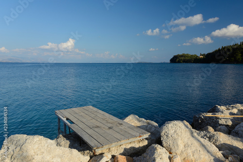 a small wooden jetty in Ipsos, Corfu (Ionian Islands, Greece)  photo