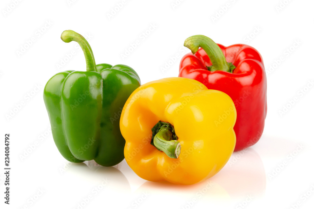 Three different colored of sweet bell peppers (capsicum) isolated on white background.. Three different colored of sweet bell peppers (capsicum) isolated on white background..