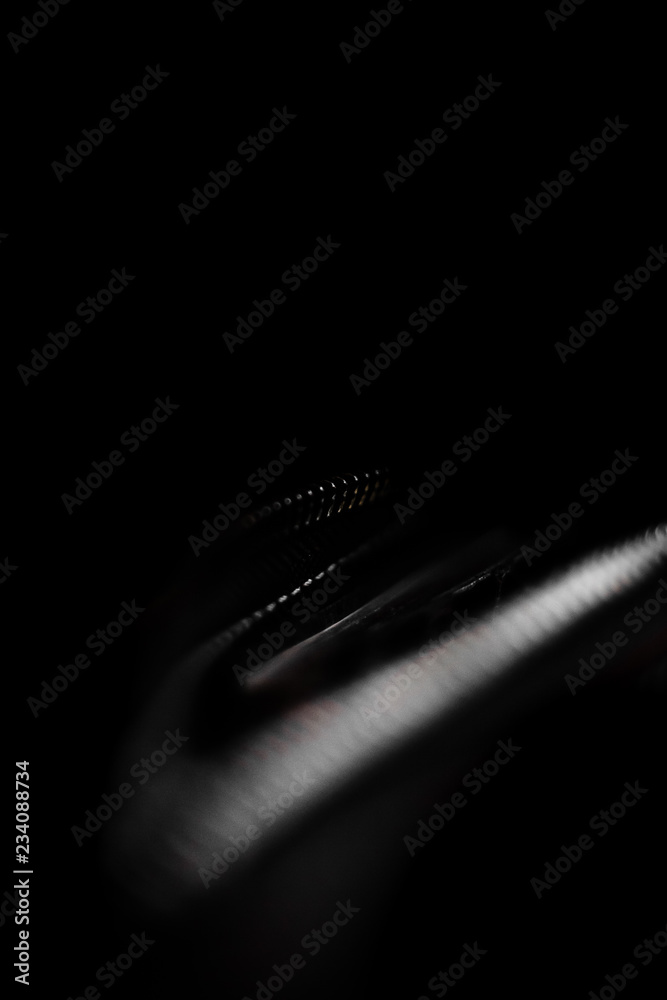 Zipper on a briefcase on a black background