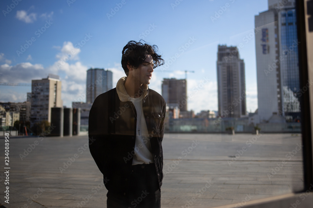 portrait of young man in the city portrait of young man in the city