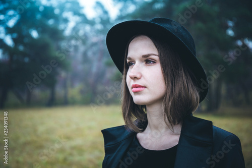 Portrait of a girl in the gloomy forest © Mallivan