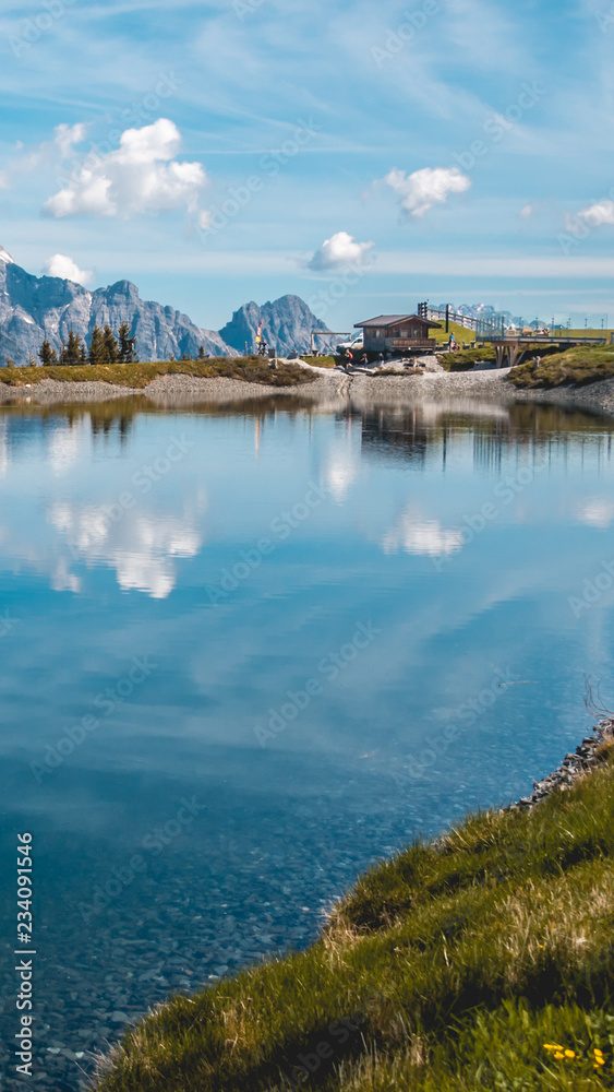 Smartphone HD wallpaper of  Beautiful alpine view at Leogang - Tyrol - Austria with reflections