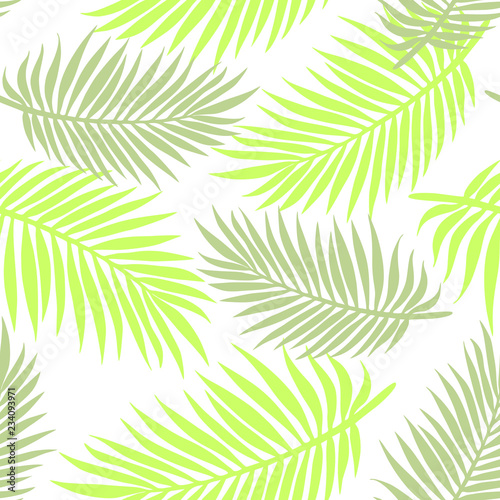 Green palm leaves. Seamless summer pattern