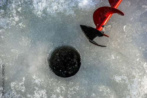 Ice auger made the hole