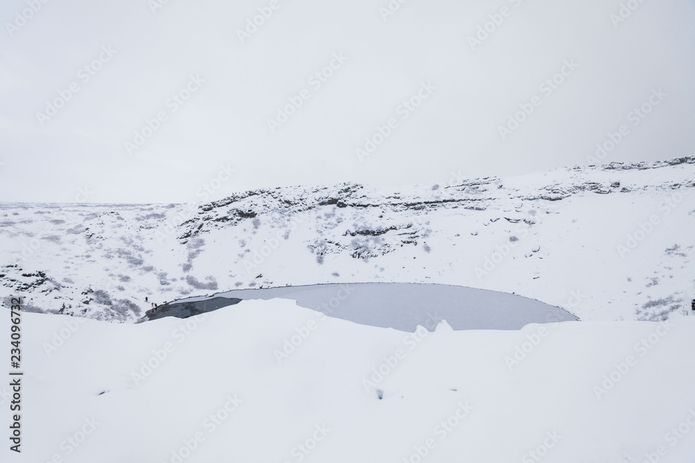 Kerid volcano crater during winter snow in Iceland