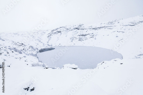 Kerid volcano crater during winter snow in Iceland