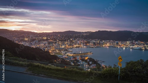Beautiful view of the city centre in Wellington, New Zealand in the evening as the lights brighten up the city. Timelapse video.