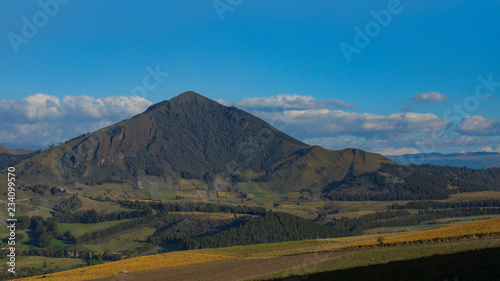 View of fields planted in the Ecuadorian mountains near the Cotopaxi volcano