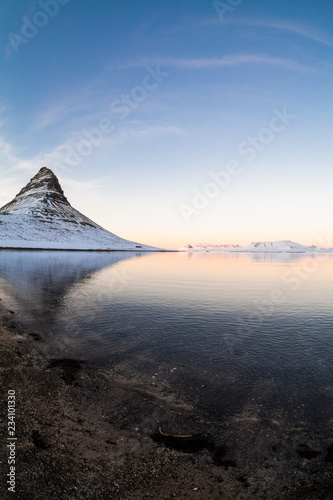 Kirkjufell view during winter snow which is a high mountain on the north coast of Iceland s Snaefellsnes peninsula  near the town of Grundarfjordur 