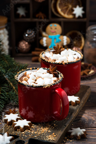 cozy winter drink hot chocolate in red mugs, vertical