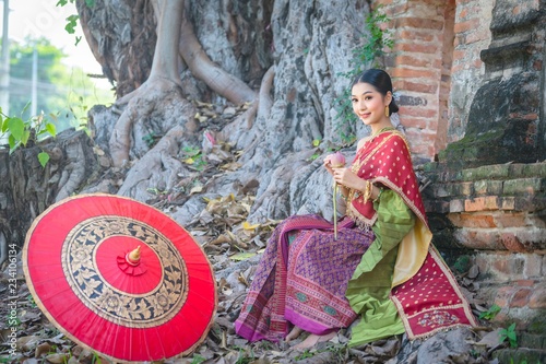 Asia woman in Thai dress traditional-Noppamas Queen Contest in Loy Kratong photo