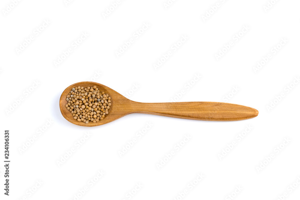 top view of a spoon of sandal wood with mustard seeds isolated on white background top view of a spoon of sandal wood with mustard seeds isolated on white background