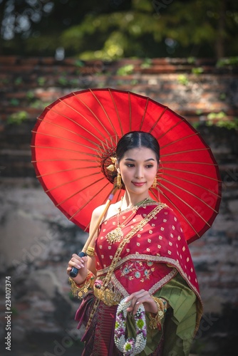 Thai girl dressed in Thai costume in the historical park