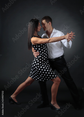 Couple in love dancing in the Studio.