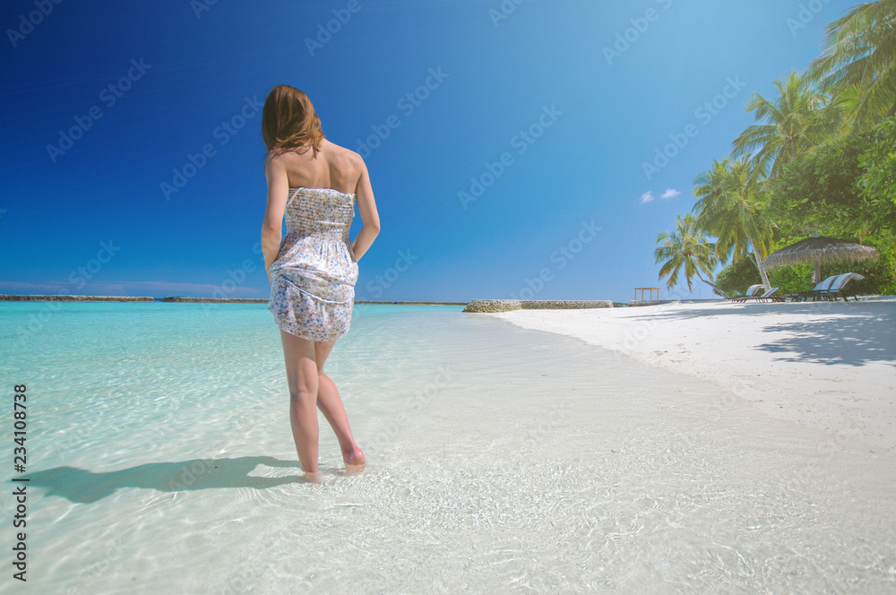 Young woman in clean sea water. Summer vacation concept Young woman in clean sea water. Summer vacation concept