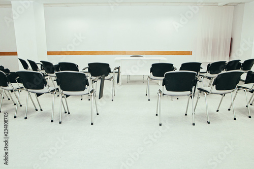 Business meeting Seminar room empty Seats with Blank Mock up white board photo