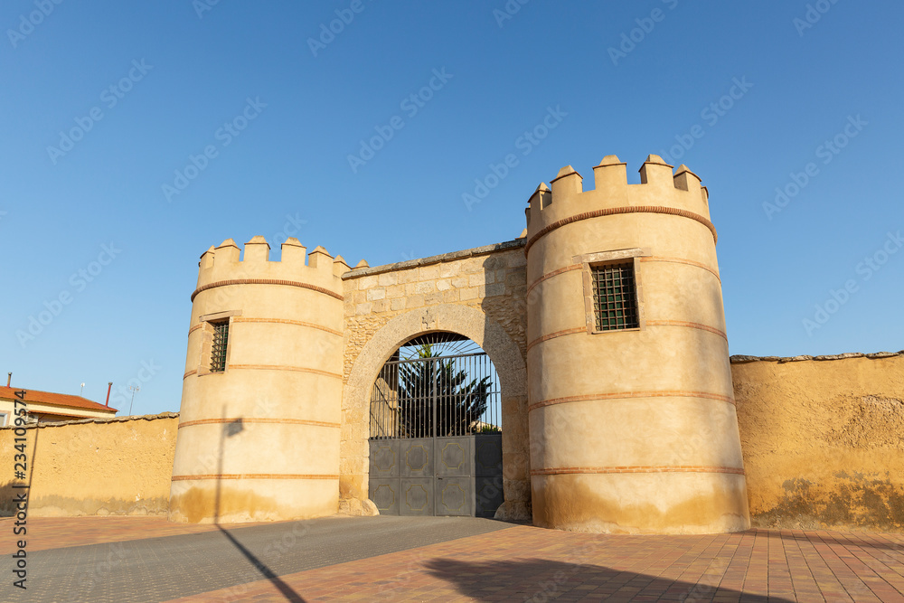 the entrance gate to the Parador at Minaya town, province of Albacete, Castile La Mancha, Spain the entrance gate to the Parador at Minaya town, province of Albacete, Castile La Mancha, Spain
