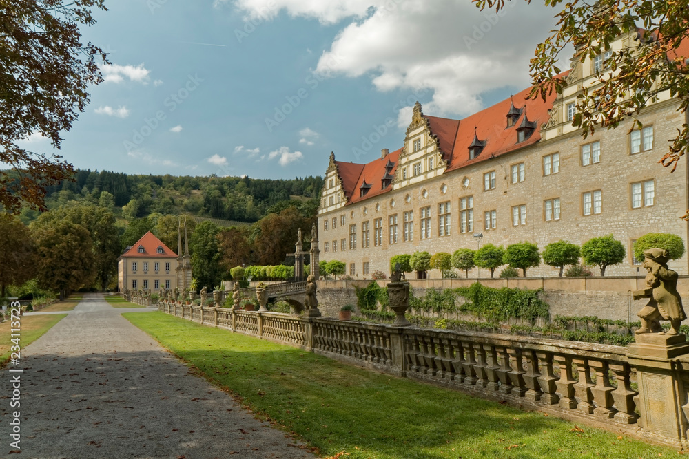 Weikersheim , Germany - view of the palace with a decorative, stone fence.