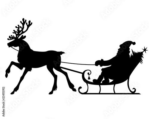 Silhouette Santa riding on reindeer sleigh
