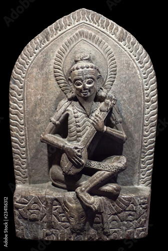 Ancient statue of Narada - heavenly musician in hindu temple in Patan, Kathmandu Valley, Nepal