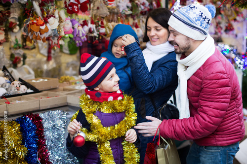Family purchasing Christmas decoration