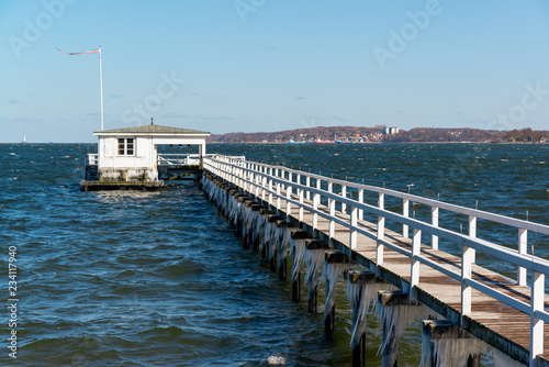 Eiszapfen an einem Bootssteg an der Kieler Innenförde im Winter photo