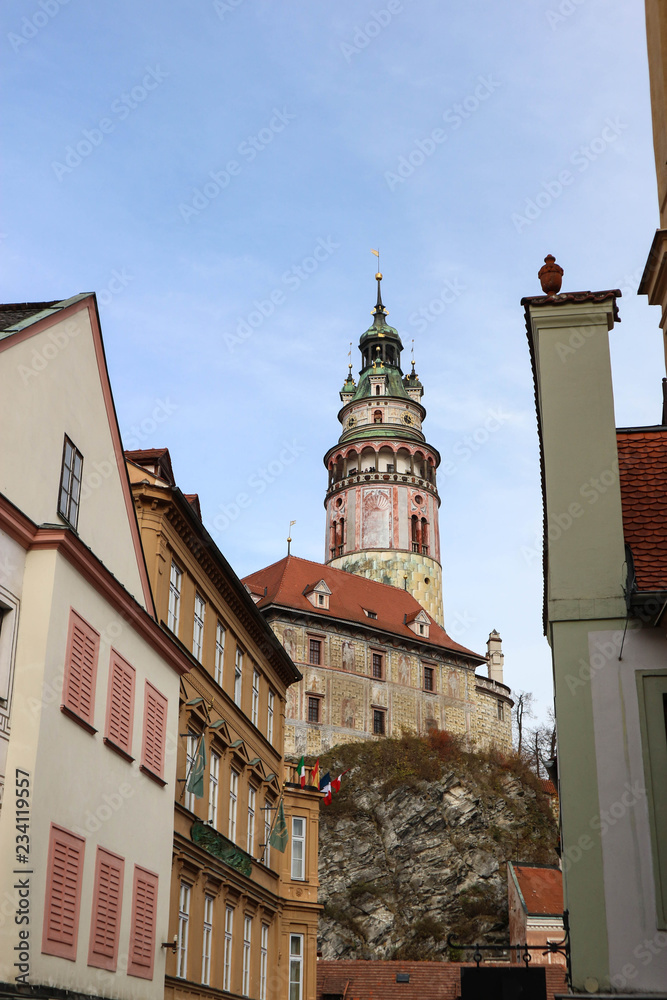 Cesky Krumlov castle tower view from the street of old town