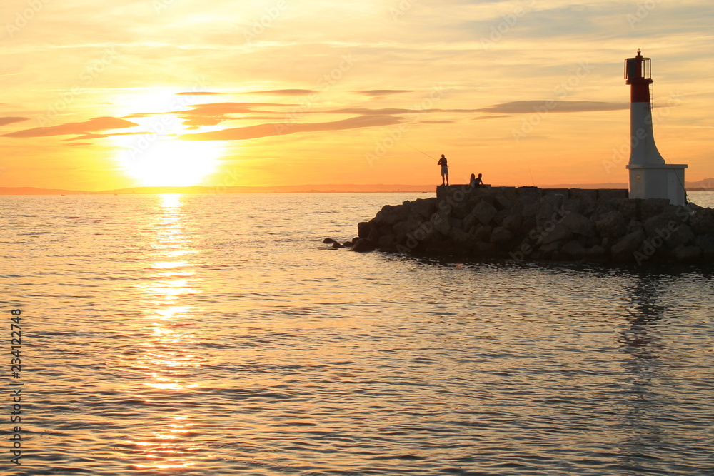 Amazing sunset over the mediterranean, Grau du Roi , a seaside resort on the coast of occitanie region in France