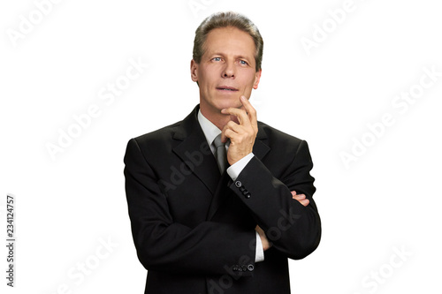 Portrait of pensive male corporate. Handsome mature businessman is thinking isolated on white background.