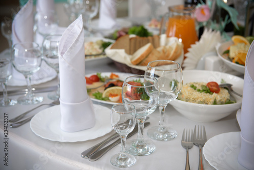Cold dishes and snacks on the festive table. A rich luxurious meal in the restaurant. 
