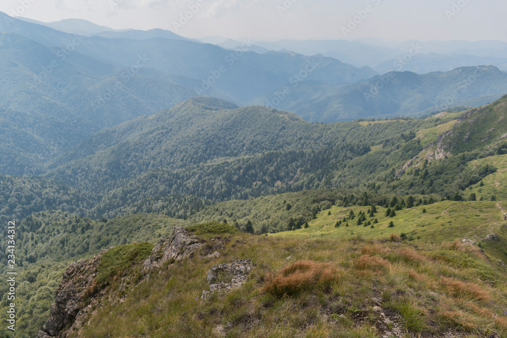 Beautiful mountain view from the hills on the path to the Eho hut. The Troyan Balkan is exceptionally picturesque and offers a combination of wonderful mountain scenery, fresh air. Beautiful mountain view from the hills on the path to the Eho hut. The Troyan Balkan is exceptionally picturesque and offers a combination of wonderful mountain scenery, fresh air.