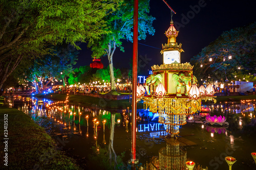 Beautiful scene of The light color Sukhothai Co Lamplighter Loy Kratong Festival at The Sukhothai Historical Park covers the ruins of Sukhothai, in what is now Northern Thailand. photo