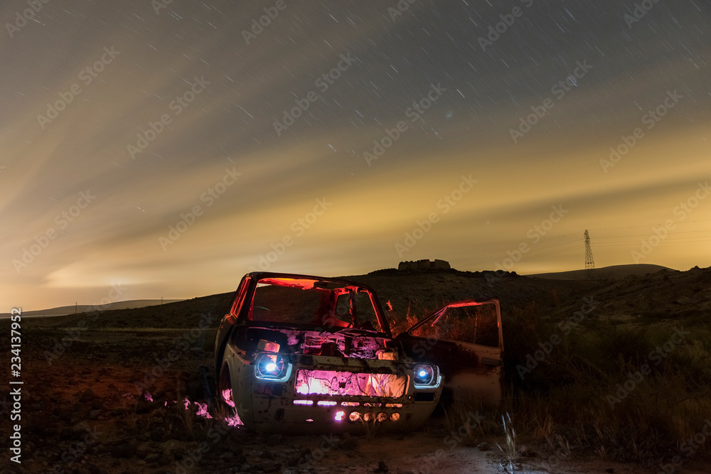 lightpainting over the abandoned car