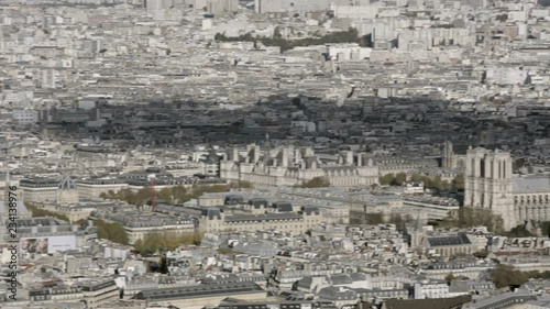 Aerial establishing shot of the Pompidou center and Notre Dame in Paris. 