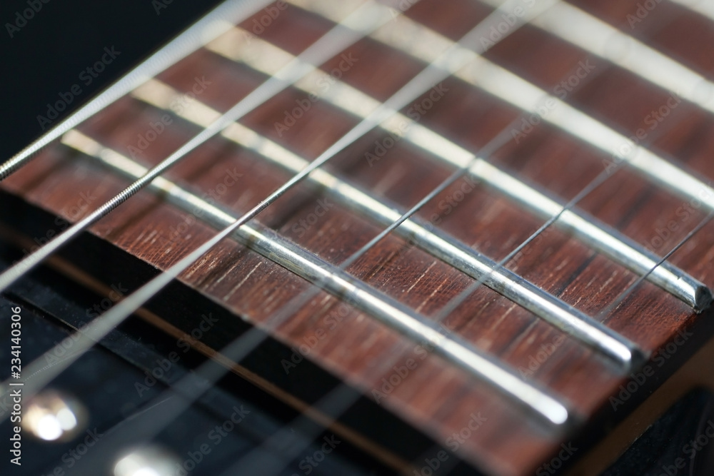 guitar with wooden brown neck and strings, close up blurry background, texture, abstract guitar with wooden brown neck and strings, close up blurry background, texture, abstract