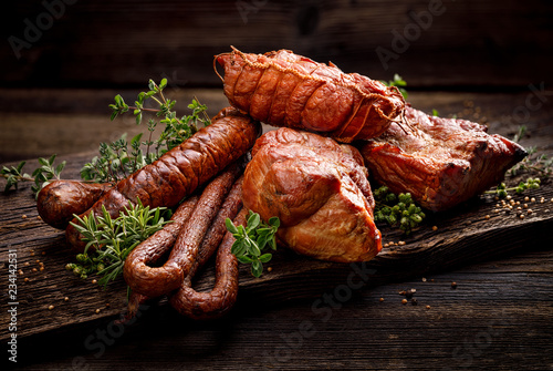 Fototapeta Smoked meats and sausages