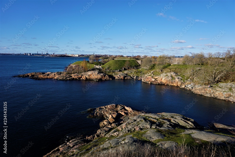 Panoramic view over deep blue baltic sea and island of Suomenlinna to Helsinki