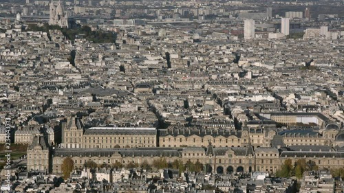 Aerial establishing shot of the Louvre in Paris. Panning left and right. daytime