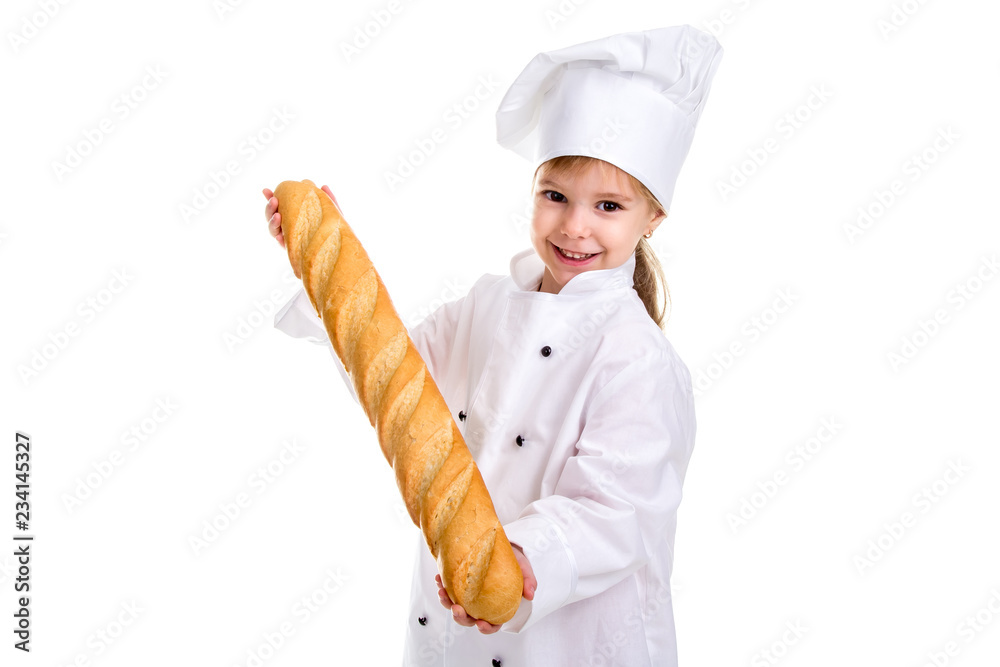 Happy smiling chef girl in a cap cook uniform, advertising the long loaf of bread. Looking at the camera. Landscape image Happy smiling chef girl in a cap cook uniform, advertising the long loaf of bread. Looking at the camera. Landscape image