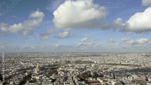 Wide Angle establishing shot Paris city with panning left intro. Daytime