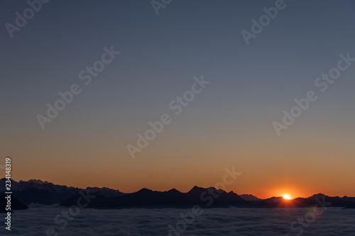 Sunset over sea of fog