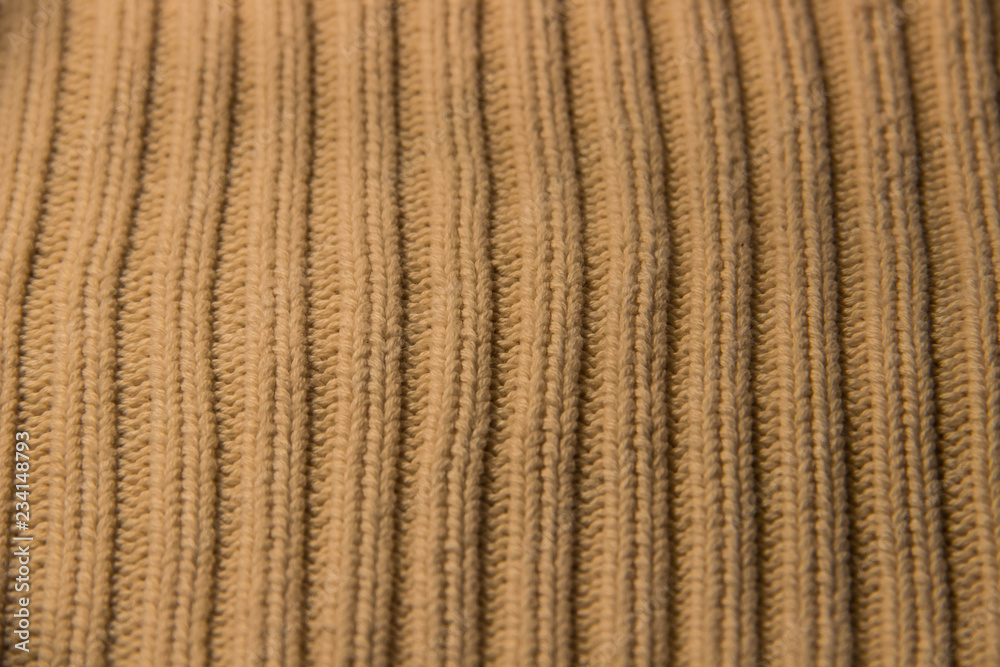 texture of knitted stripes of beige yarn texture of knitted stripes of beige yarn