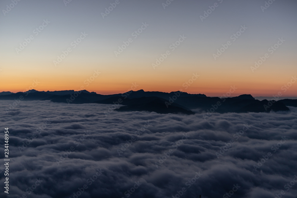 Sunset over sea of fog