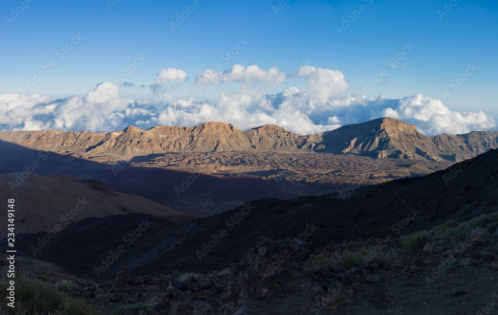 Beautiful view f the mountain range in the rays of setting sun. Pico del Teide, Canary Islands