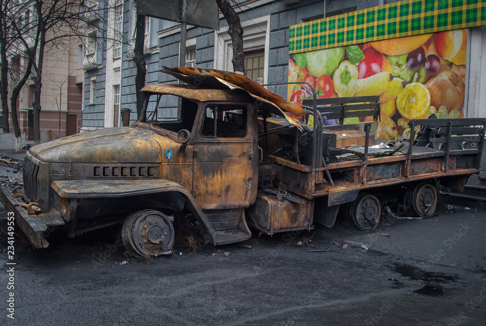 Kiev Ukraine. February 23, 2014. Burned cars on the streets of the city during protests on EuroMaidan.