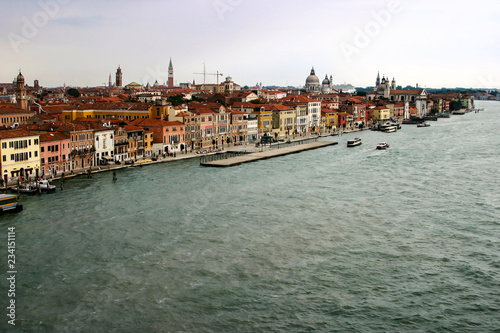 Aerial view of venice with its channels. Old colored buildings. Canal with Gondolas.