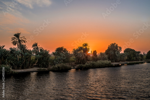 Sunset at the bank of river Nile photo