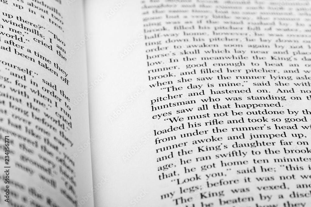 English words shown on two open book pages with selective depth of field. English words shown on two open book pages with selective depth of field.