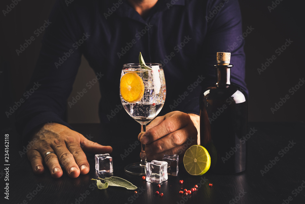 dark background whiskey ice glass ice hand photo moody pouring alcohol bourbon bartender bar hotel home