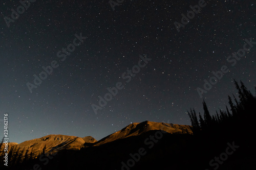 Lunar alpenglow above the San Juan Mountains in Colorado